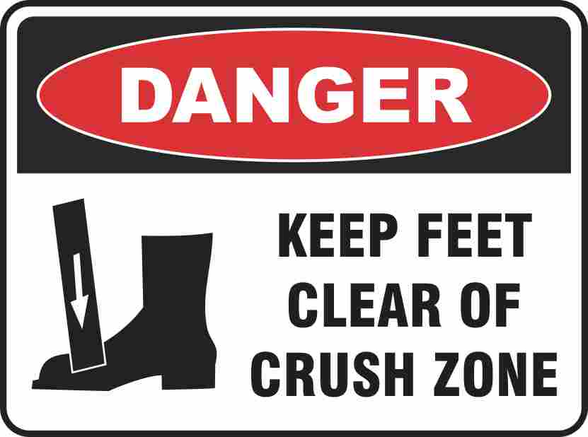 The "Danger Keep Feet Clear" sign features a red "DANGER" oval, below which are the words "KEEP FEET CLEAR OF CRUSH ZONE" beside a boot and downward arrow graphic, commonly used to warn of crush hazards.