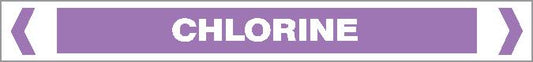 A rectangular sign labeled "CHLORINE" in bold white uppercase letters, with a light purple background, white border, and angled brackets on each end. Product: Pipe Marker - ACID / ALKALI - CHLORINE.