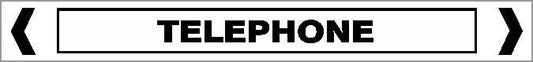 A rectangular pipe marker with "TELEPHONE" in bold, black, capital letters centered between two black inward-pointing arrows, labeled as Pipe Marker - COMMS - TELEPHONE.