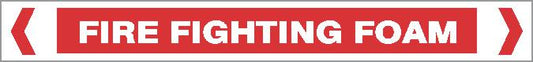 A red and white Pipe Marker for "FIRE - FIRE FIGHTING FOAM" features bold white text on a red background with inward-pointing white arrows at both ends.