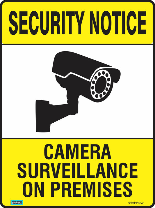 The Security Cam Surv On Premises sign features a yellow design with "SECURITY NOTICE" on top, a camera icon in the center, and "CAMERA SURVEILLANCE ON PREMISES" below. It complies with AS/NZS1319 safety sign standards.