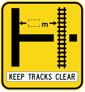 W7-12-3n(R) - Rail Crossing On Side Road (symbolic - 'T' junction Right) Keep Tracks Clear